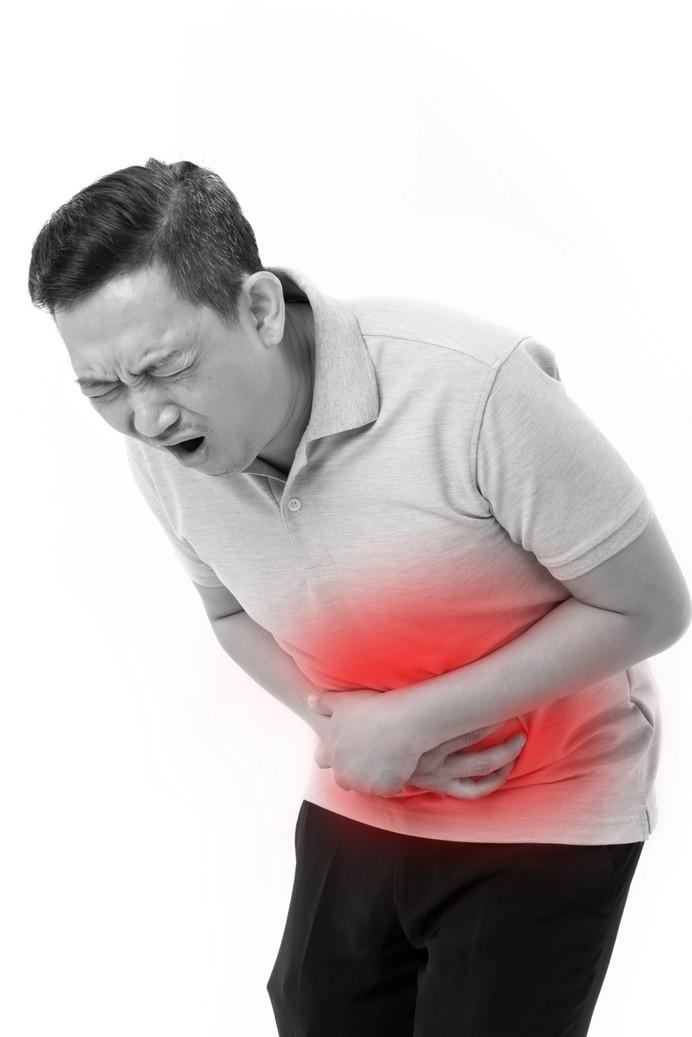 asian man suffering from stomachache, constipation, indigestion,